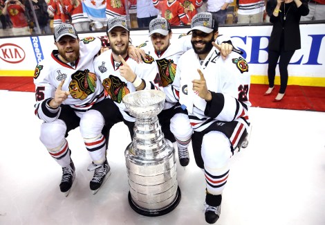The Blackhawks celebrate with the Cup. And they had to go through the Western Conference to win it.