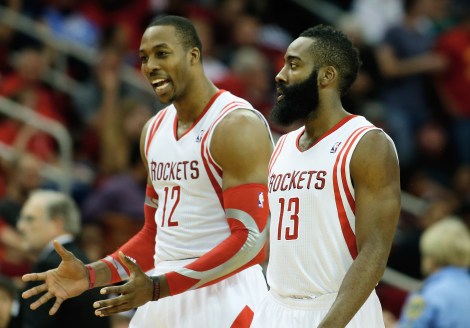 HOUSTON, TX - NOVEMBER 11:  Dwight Howard #12 and James Harden #13 of the Houston Rockets walk off the court during the game against the Toronto Raptors at Toyota Center on November 11, 2013 in Houston, Texas. NOTE TO USER: User expressly acknowledges and agrees that, by downloading and or using this photograph, User is consenting to the terms and conditions of the Getty Images License Agreement.  (Photo by Scott Halleran/Getty Images)