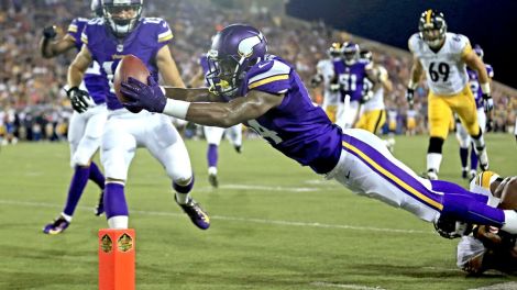 Wide receiver Stefon Diggs dives for a touchdown