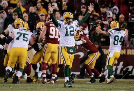Aaron Rodgers celebrates a win in Washington.
